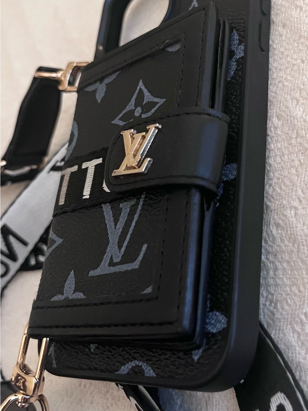 14 Pro Max Case with Card Slot includes lightweight logo crossbody strap